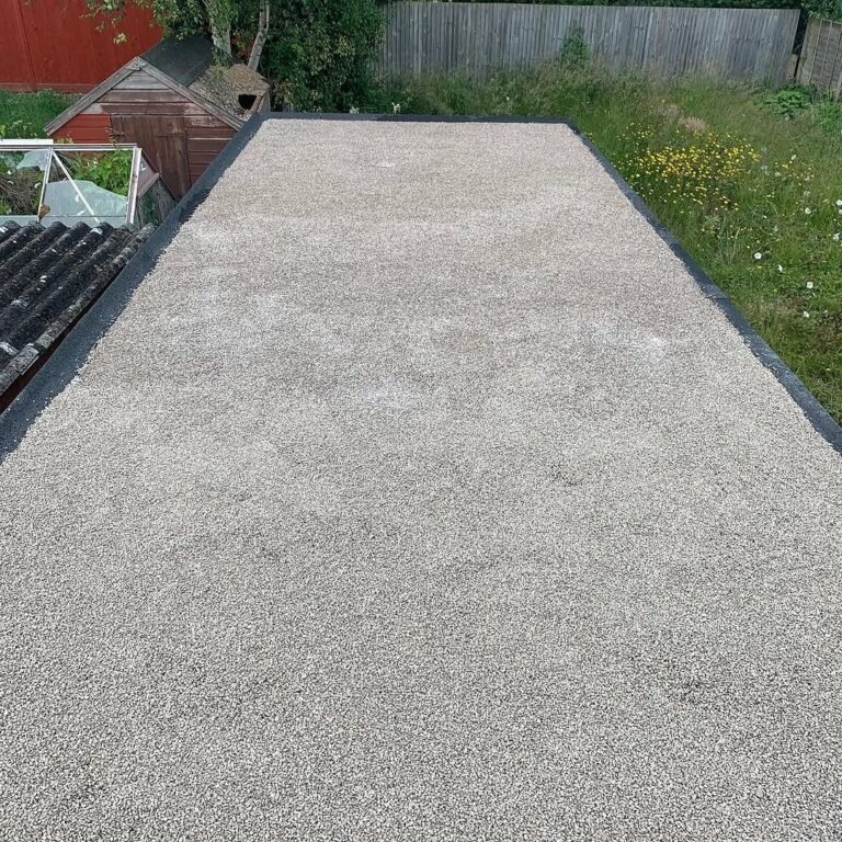 GRP fibreglass flat roof with mineral finish on a garage in Lancing