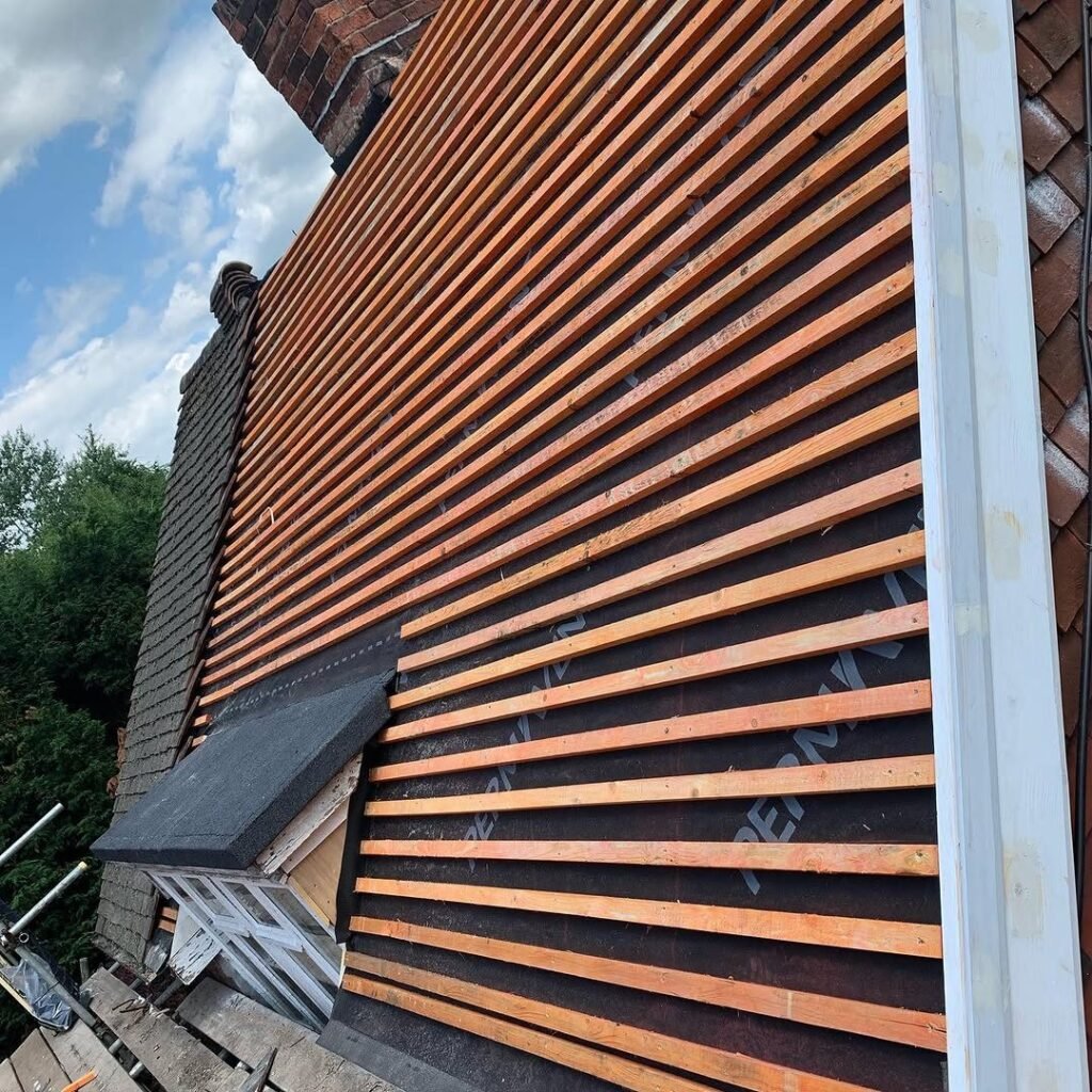 New battens and breathable membrane during a full re-roof in Lancing