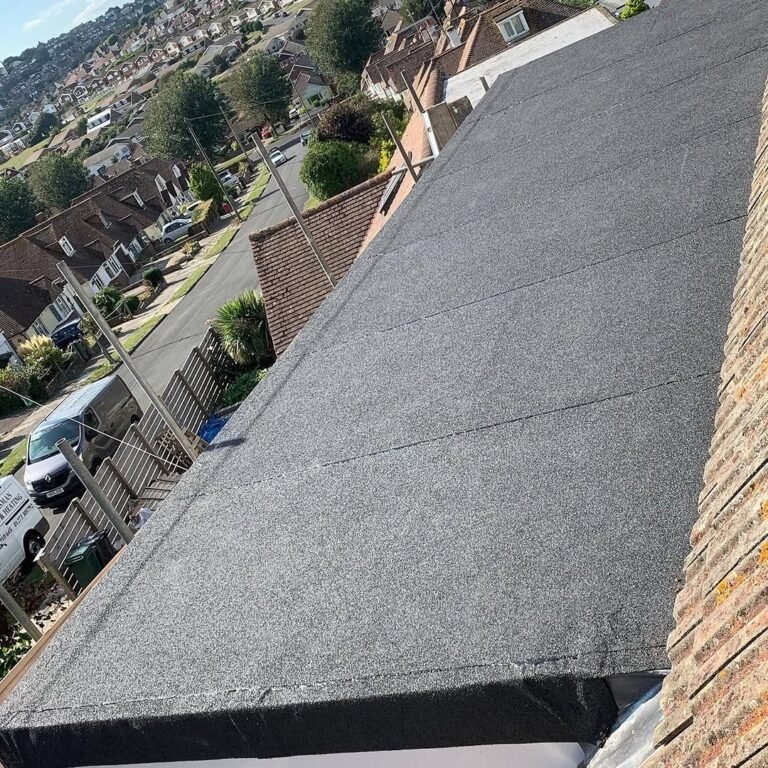 New flat roof overlooking Lancing rooftops and the South Downs