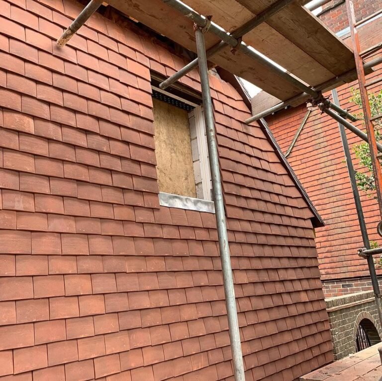 New tiles laid on a re-roof in Lancing