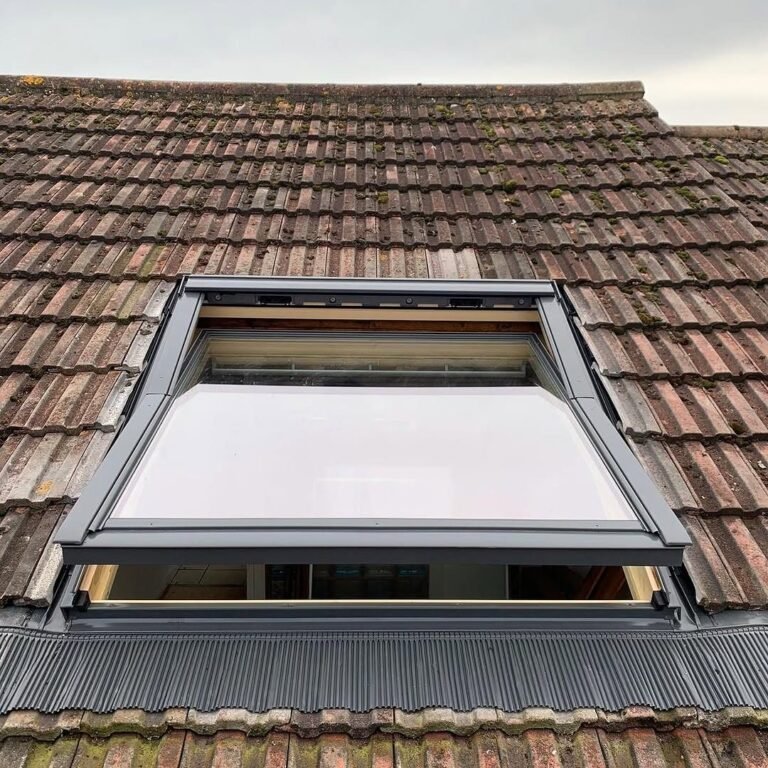 New Velux roof window fitted in a tiled roof in Lancing