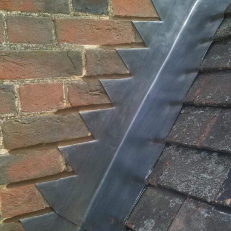 Stepped lead flashing against brickwork on a chimney in Lancing